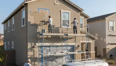 Professional stucco repair on Sacramento CA home exterior by expert house painters restoring cracked walls